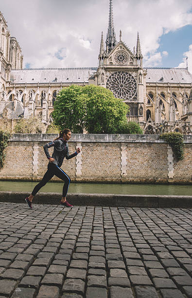istock Sports woman jogging in Paris 542291966