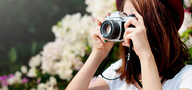 istock Girl Camera Photographer Focus Shooting Nature Concept 542292332