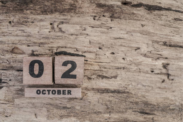 istock cube calendar for october on wooden background with copy space 542293364