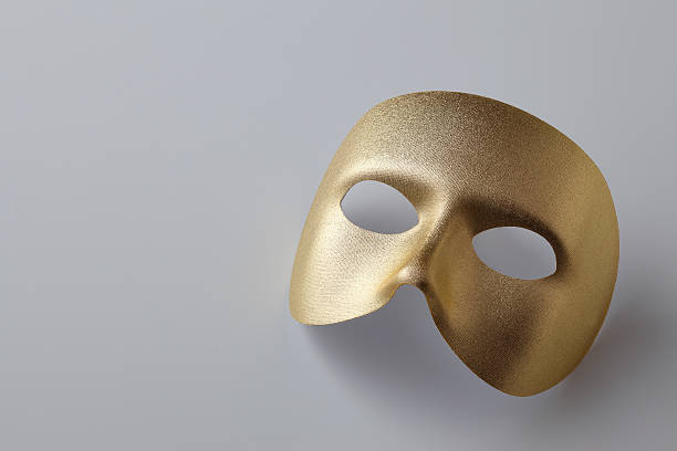 Golden mask Plain golden mask for drama mask disguise stock pictures, royalty-free photos & images