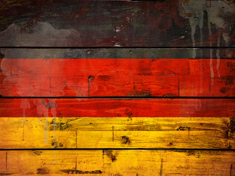 Flag of Germany painted on a grunge plank