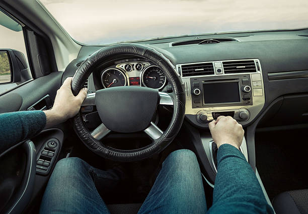 istock Man driving in the car. 542298318