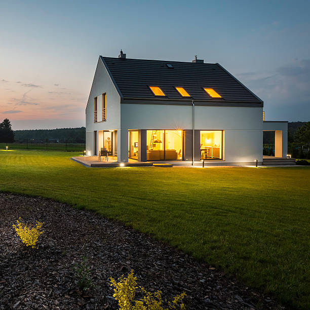 istock Stylish and modern house at night 542300224