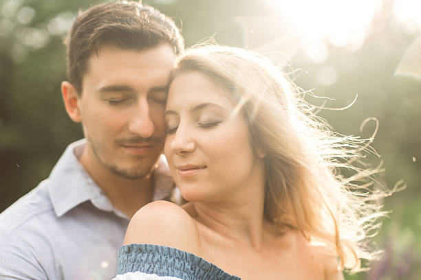 istock loving couple embracing each other in nature 542301882