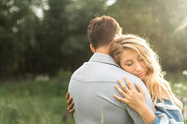 istock loving couple embracing each other in nature 542302066