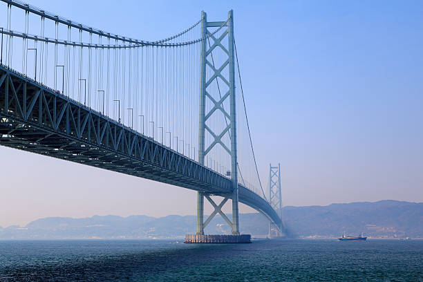akashi-kaikyo, kobe, japan  - kobe bridge japan suspension bridge stock-fotos und bilder