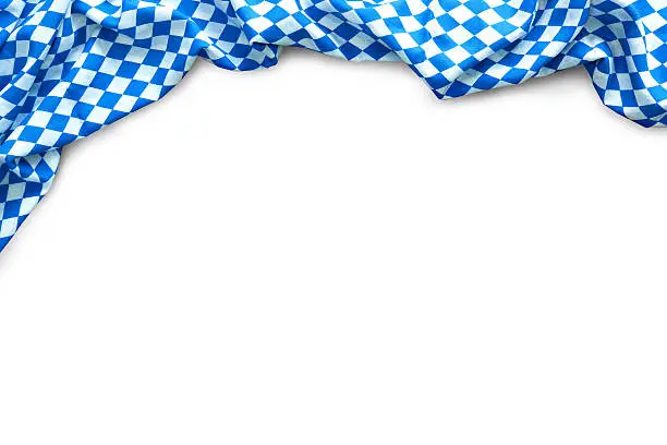 Background for Beer Fest with bavarian white and blue fabric isolated on white