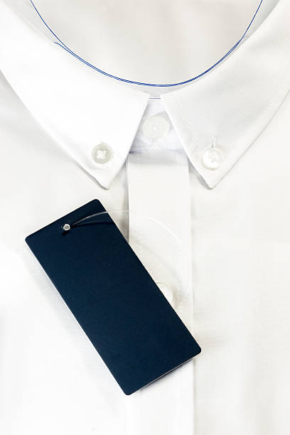istock Formal white male shirt with empty tag 542310550