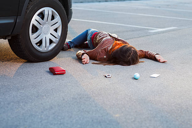 istock Traffic accident..young woman hit by a car 542311326