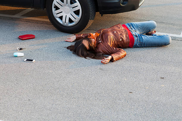 istock Traffic accident..young woman hit by a car 542311640