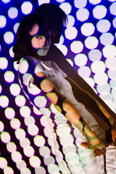 istock Woman covered by bokeh light 542315234