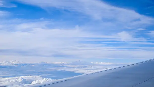 View through the window of a passenger plane flying above London, taken few minutes before landing at Heathrow terminal 3, London, United Kingdom