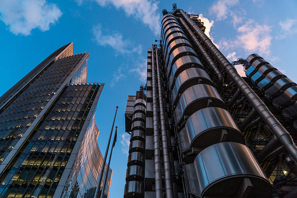 istock Low angle view corporate modern building against sky 542321566