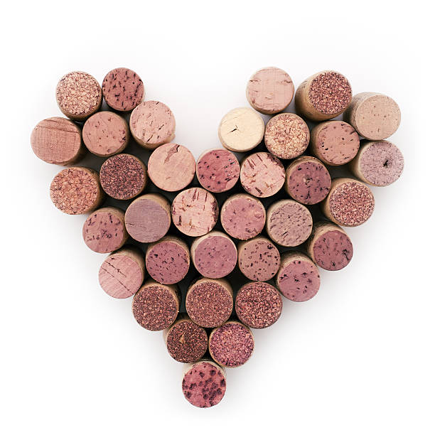 istock Background of various colored used wine corks in heart's shape 542322770