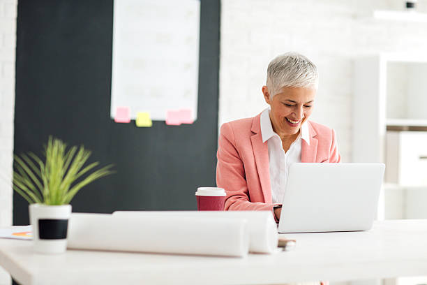 istock Mature Businesswoman Working In Her Office. 542323720