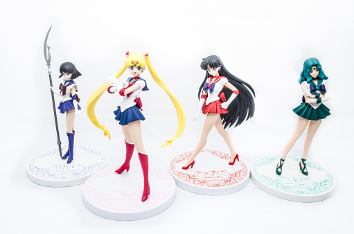 Milan, Italy - June 14, 2016: Closeup on Sailor Moon, Sailor Mars, Sailor Neptune and Sailor Saturn Action Figures isolated on white. 