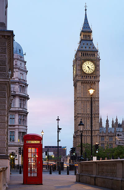 Big Ben and red London call box, early morning Big Ben and red London call box in the early morning, natural colors and lights big ben stock pictures, royalty-free photos & images