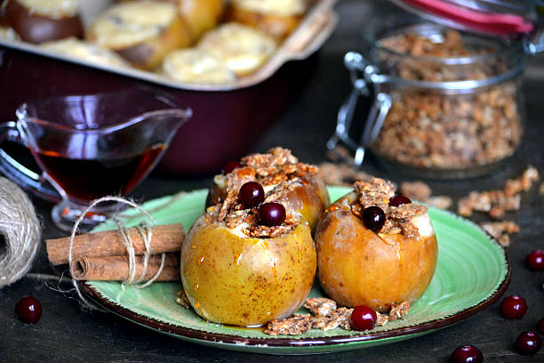 istock Baked apples with honey, nuts, berries and granola 542326264