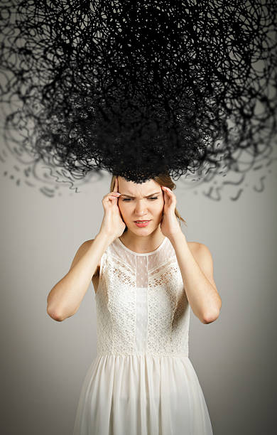 istock Girl in white and chaos 542326430