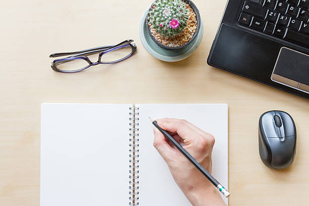 istock office table with office supplies. view from above with copyspace 542326824