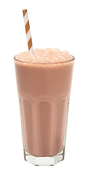 chocolate milkshake in a tall glass isolated stock photo