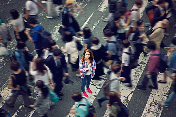 Lost in Japan Young caucasian girl is angry because she is lost in the crowd. osaka prefecture photos stock pictures, royalty-free photos & images