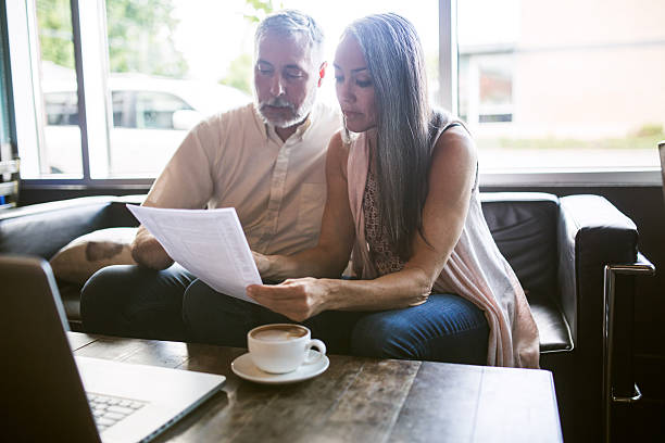 istock Mature Couple Discussing Finances 542330822