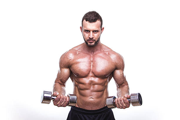 istock Handsome Muscular Man Exercise WIth Dumbbells 542331204