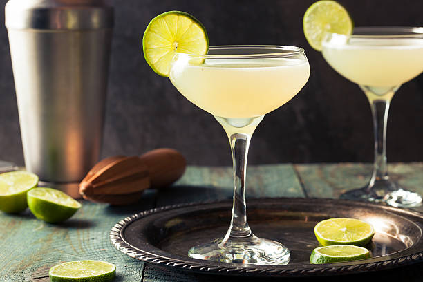 Classic Lime Daiquiri Cocktail Classic Lime Daiquiri Cocktail with a Garnish daiquiri stock pictures, royalty-free photos & images