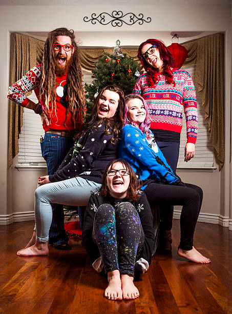 istock Family Wearing Cheesy Christmas Sweaters 542547574