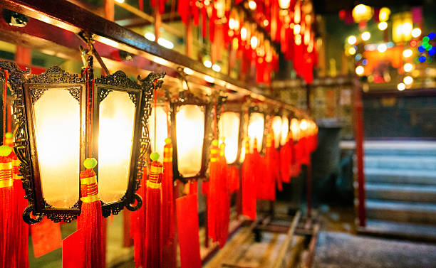istock Row of red lanterns in Buddhist temple 542548374