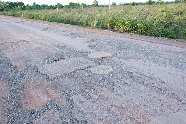 istock Hole on damage road way asphalt 542551350