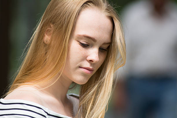 istock Close-up of thoughtful girl 542551956