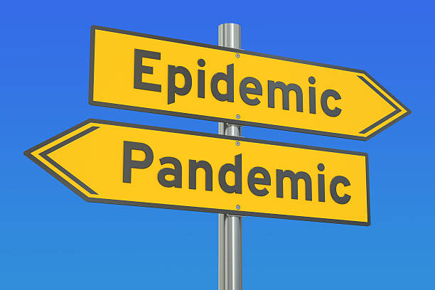 istock epidemic vs pandemic concept on the road signpost. 3D rendering 542555250