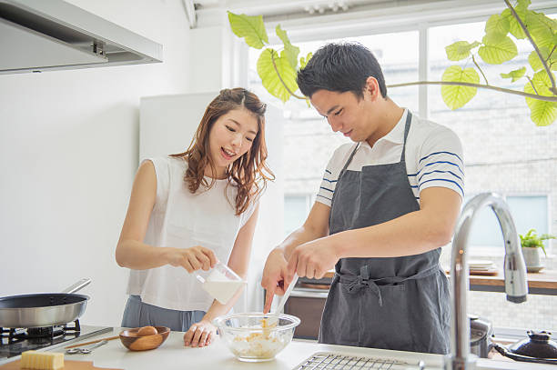 istock Japanese young couple cooking on holiday 542555784