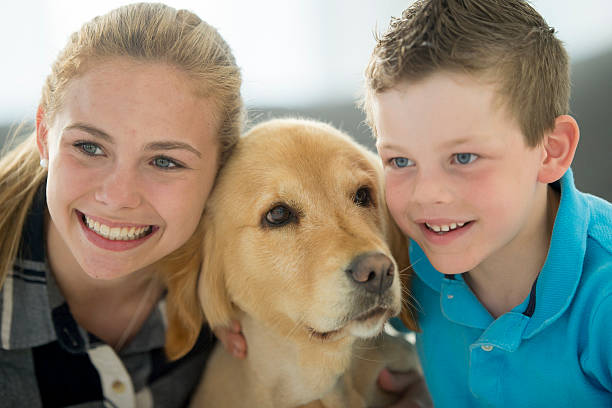 istock Smiling with the Family Pet 542555938