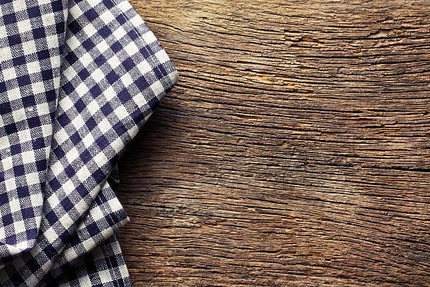 istock checkered napkin on old wooden table 542556614