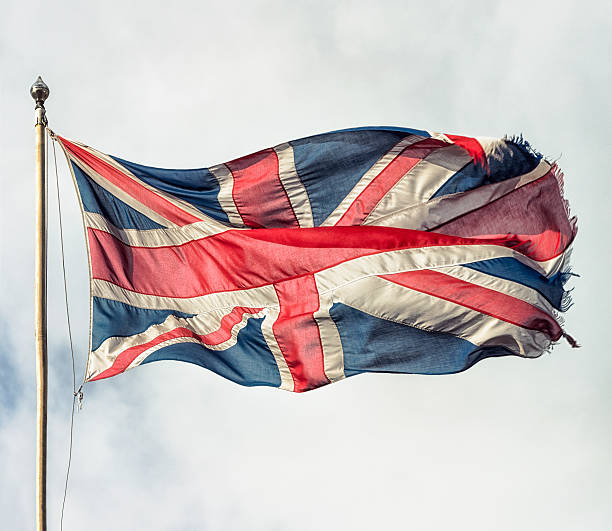 istock Frayed and faded British union flag 542560972
