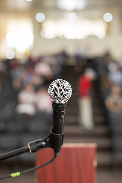 istock microphone against the background of convention center 542561430