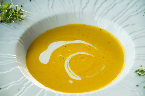 istock background Pumpkin soup in white bowl 542562718