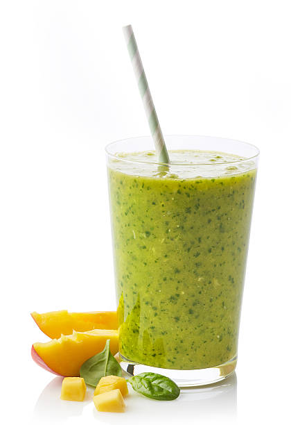 istock Glass of fruit and spinach smoothie 542563530