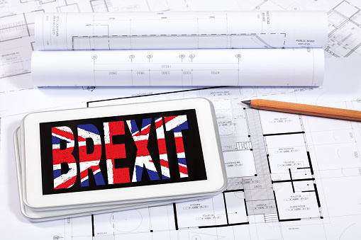Tablet Computer Displaying The Word Brexit With An Image Of The British Flag