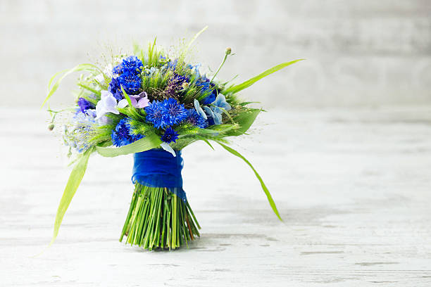 istock Wheat and cornflower wedding bouquet. 542564640