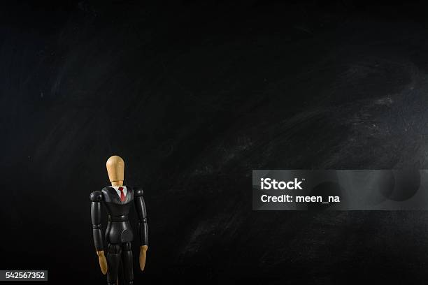 Wood Figure Business Man Black Ground Black Broad Stock Photo - Download Image Now