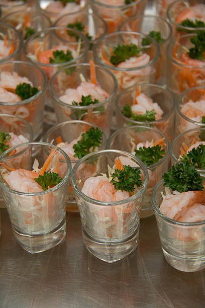 istock mini glass shrimp cocktail with cocktail sauce 542570330