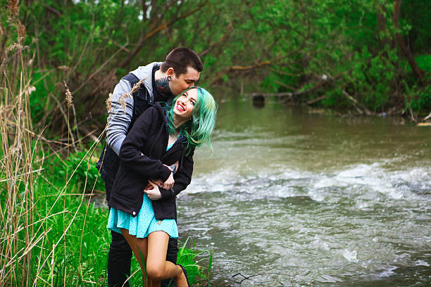 The Love story of young people outdoors.