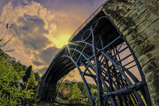 bridge iron bridge shropshire uk - the first ever iron bridge symbol of the beginning of the industrial revolution ironbridge shropshire stock pictures, royalty-free photos & images