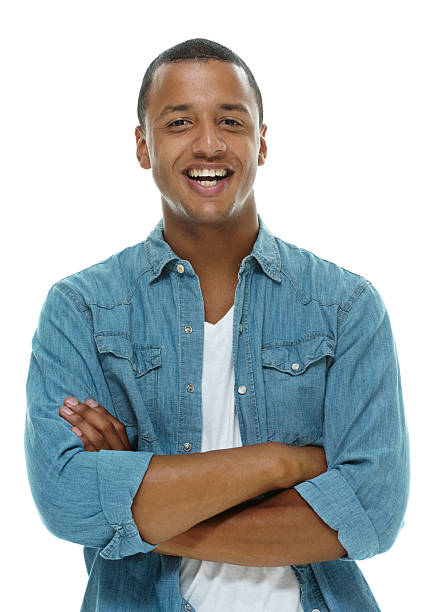 istock Smiling casual man standing with arms crossed 542576374