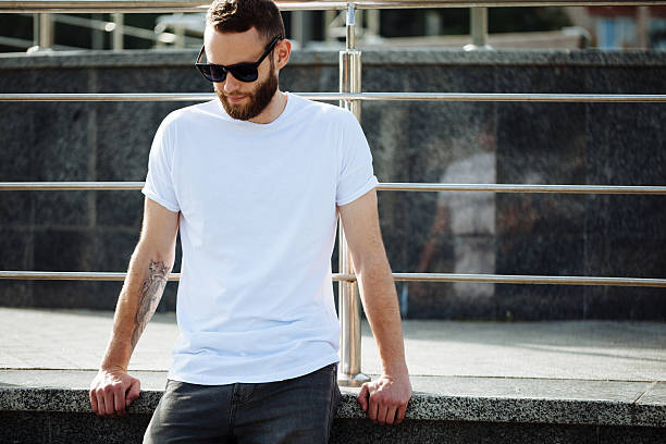 hipster wearing white blank t-shirt with space for your logo - white clothing imagens e fotografias de stock