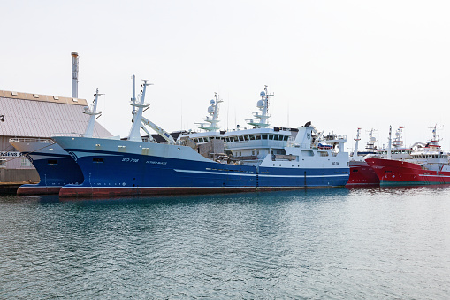 Skagen, Denmark - May 17, 2015: Fish trawlers located at the quay in the port of Skagen in Denmark.